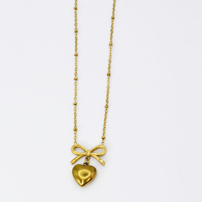dainty gold necklace, layered design, boutique wholesale, women’s accessories, statement piece, trendy style, waterproof, hypoallergenic, tarnish free