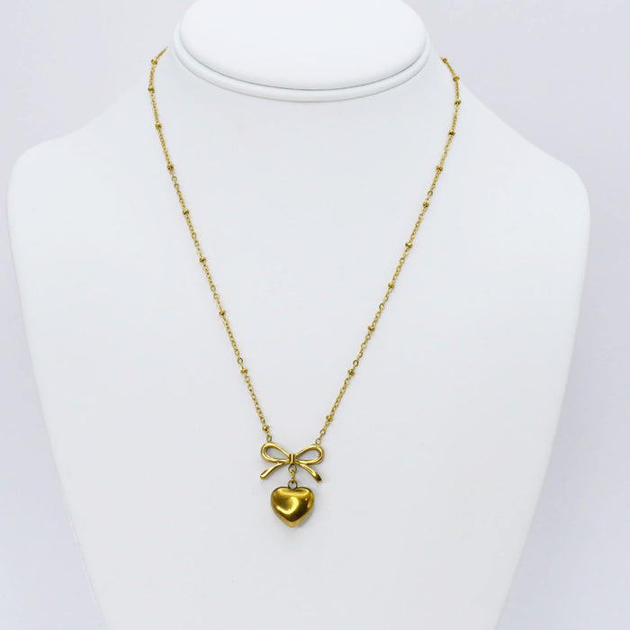 dainty gold necklace, layered design, boutique wholesale, women’s accessories, statement piece, trendy style, waterproof, hypoallergenic, tarnish free