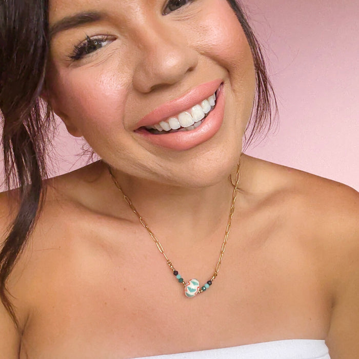 ChatGPT said:

Dainty gold layered necklace, wholesale jewelry for women's boutiques, statement accessory, boutique wholesale jewelry, waterproof necklaces, statement gold necklace, trendy gold jewelry, hypoallergenic, tarnish free