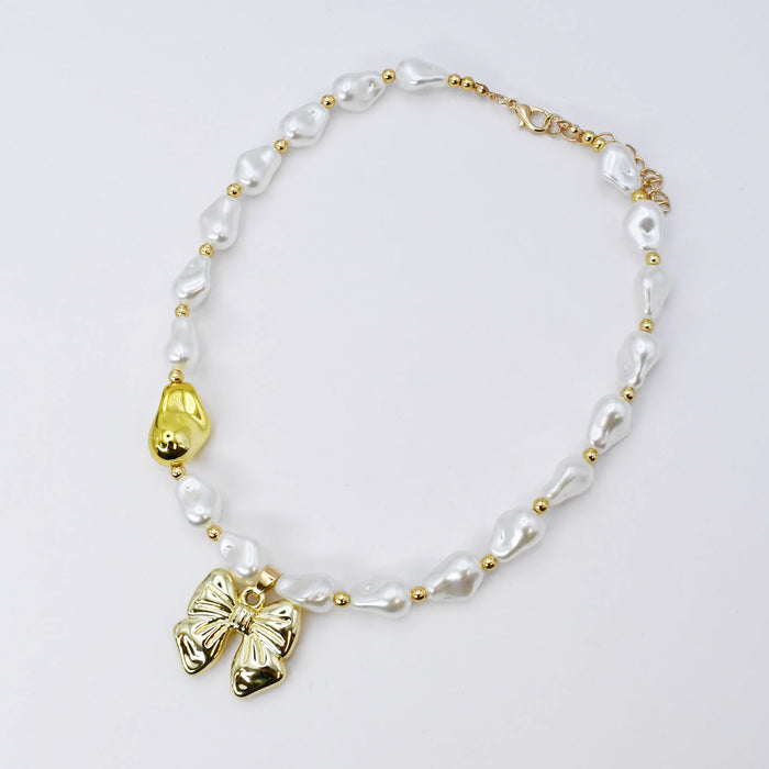 dainty gold necklace, layered design, boutique wholesale, women’s accessories, statement piece, trendy style, waterproof, hypoallergenic, tarnish free