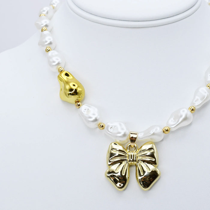dainty gold necklace, layered design, boutique wholesale, women’s accessories, statement piece, trendy style, waterproof, hypoallergenic, tarnish free
