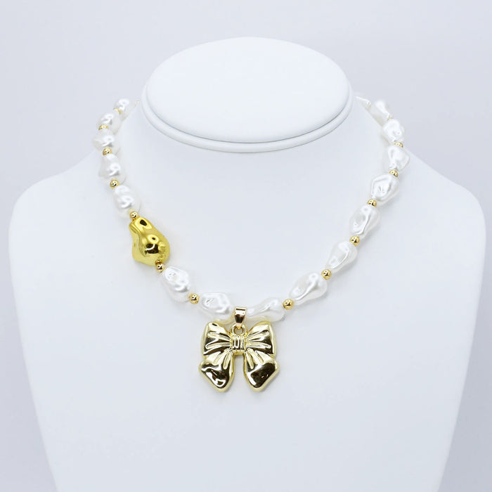 dainty gold necklace, layered design, boutique wholesale, women’s accessories, statement piece, trendy style, waterproof, hypoallergenic, tarnish free
