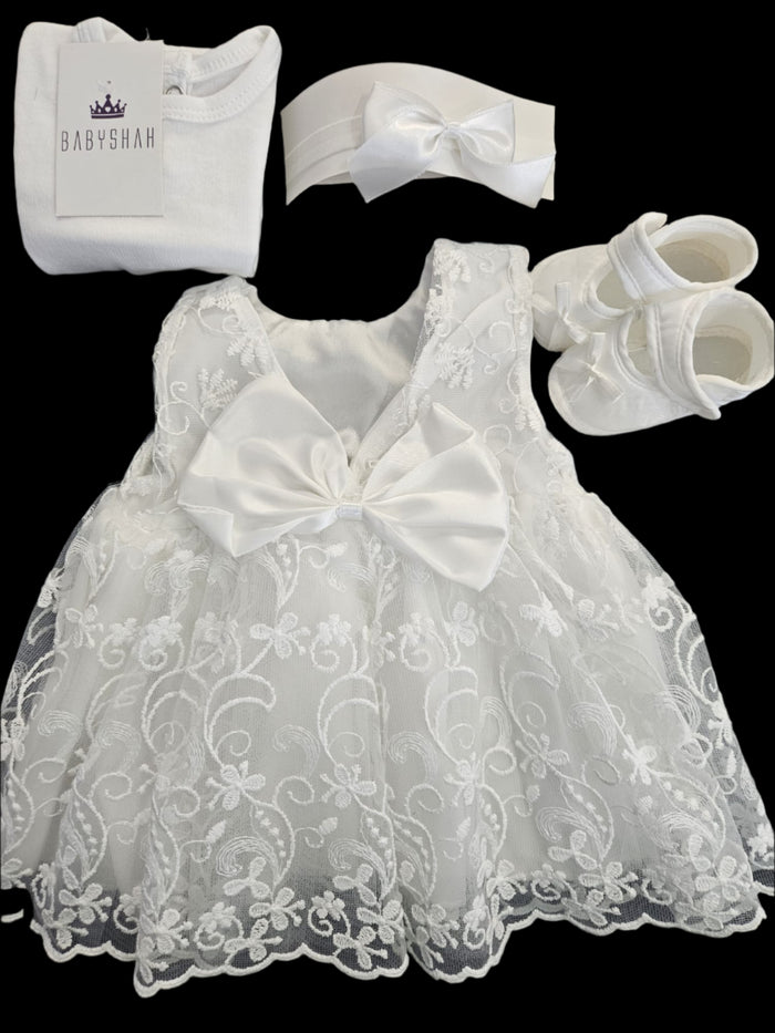 Christening dress by Pugi Baby