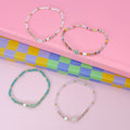 colorful gemstone jewelry, beaded fashion bracelet, gold or silver tone accessory, handcrafted beaded piece, trendy boho chic jewelry, vibrant statement wristwear, artisan handmade design, everyday stackable accessory, fashion jewelry for women, premium jewelry gift idea, boutique style wristwear, elevated modern jewelry