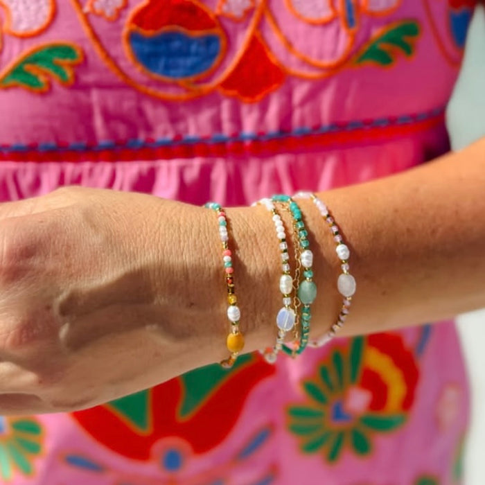 colorful gemstone jewelry, beaded fashion bracelet, gold or silver tone accessory, handcrafted beaded piece, trendy boho chic jewelry, vibrant statement wristwear, artisan handmade design, everyday stackable accessory, fashion jewelry for women, premium jewelry gift idea, boutique style wristwear, elevated modern jewelry
