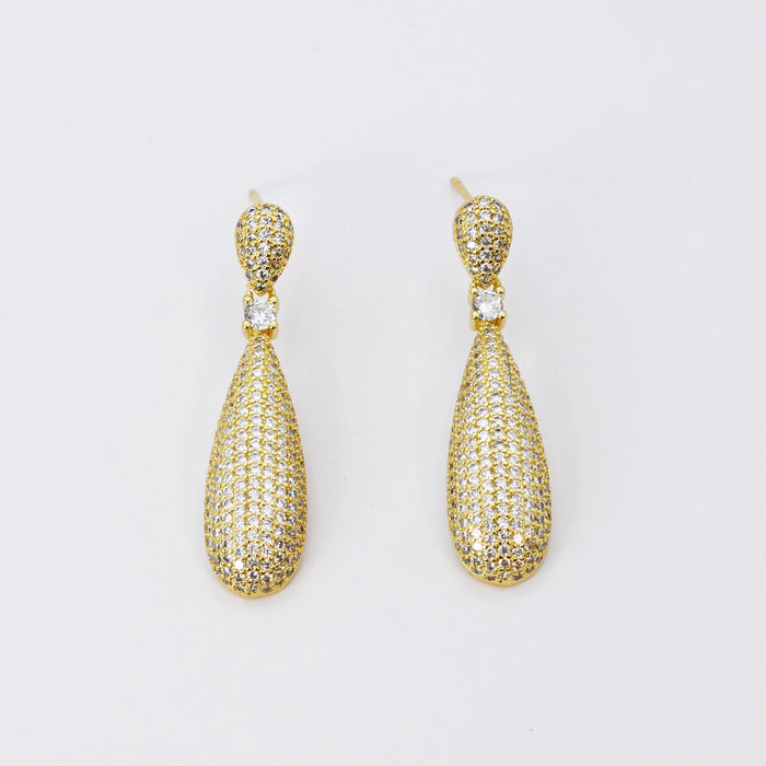 Gold teardrop pave earrings tarnish-free hypoallergenic waterproof wholesale earrings for boutique, Crystal teardrop gold dangles, Sparkling pave teardrop drops, Radiant gold teardrop shine, Micro-pave teardrop elegance, Glistening gold drop accents, Gleaming teardrop gold pieces, Polished crystal gold teardrops, Luxe gold elongated drops, Brilliant pave gold teardrops, Elegant crystal gold drops, Refined gold teardrop shimmer