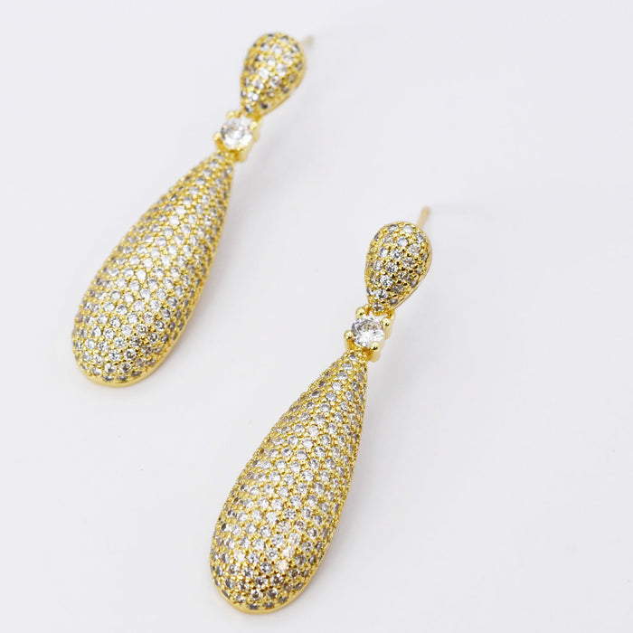 Gold teardrop pave earrings tarnish-free hypoallergenic waterproof wholesale earrings for boutique, Crystal teardrop gold dangles, Sparkling pave teardrop drops, Radiant gold teardrop shine, Micro-pave teardrop elegance, Glistening gold drop accents, Gleaming teardrop gold pieces, Polished crystal gold teardrops, Luxe gold elongated drops, Brilliant pave gold teardrops, Elegant crystal gold drops, Refined gold teardrop shimmer