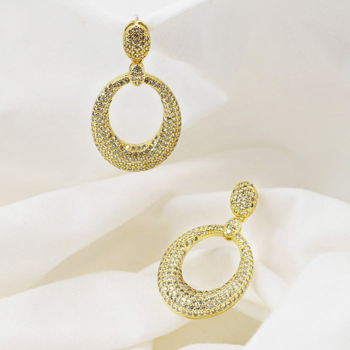 Gold oval pave earrings tarnish-free hypoallergenic waterproof wholesale earrings for boutique, Crystal oval gold drops, Sparkling pave oval dangles, Radiant gold oval accents, Micro-pave luminous ovals, Shimmer oval gold charms, Gleaming crystal gold loops, Polished oval gold shine, Elegant gold crystal arcs, Refined oval gold shimmer, Luxe crystal gold swing, Brilliant oval gold pieces