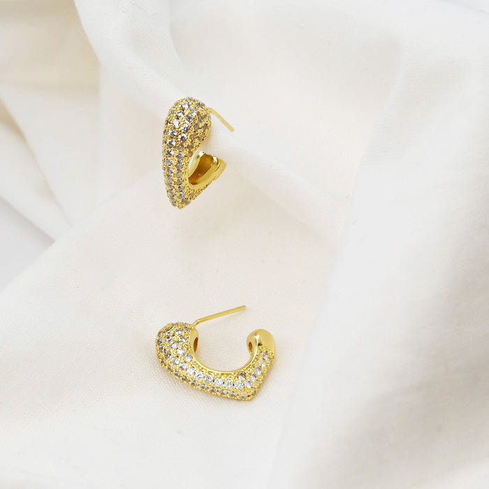 gold pave hoop earrings, sparkly curved mini hoops, boutique jewelry accessory, elegant design for women, hypoallergenic earrings, tarnish free, waterproof, wholesale earrings for boutique