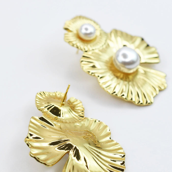 waterproof hypoallergenic earrings, tarnish free 14k gold jewelry, dainty gold earrings, gold hoop earrings, handcrafted gemstone earrings, boutique wholesale earrings, high-quality gold jewelry.pearl stud