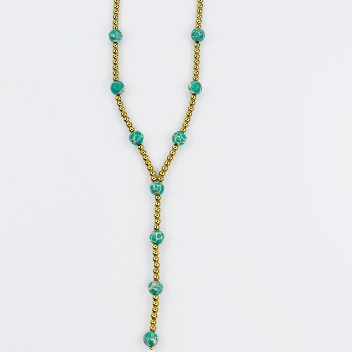 Dainty gold layered necklace with turquoise accents, wholesale jewelry for women’s boutiques, statement accessory, waterproof necklaces, boutique wholesale jewelry, trendy, hypoallergenic, tarnish free