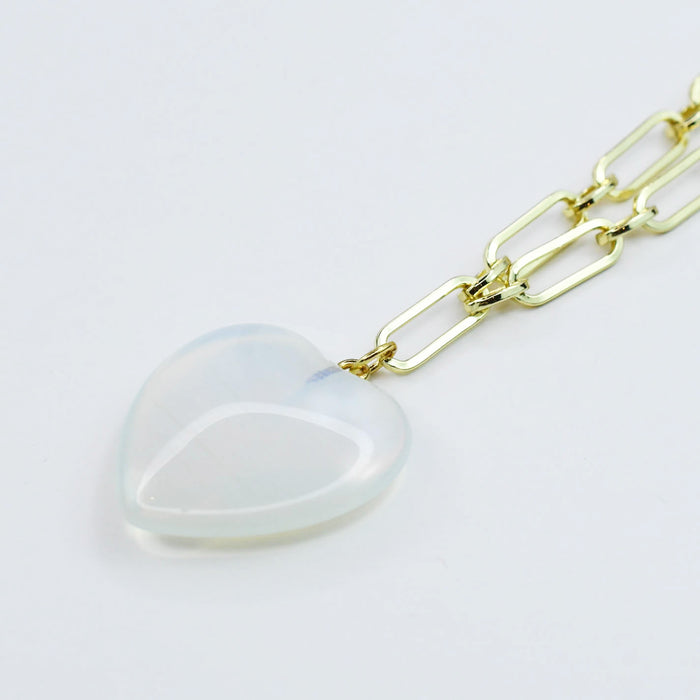 Dainty gold necklace with chic paperclip chain and translucent heart pendant, waterproof, hypoallergenic and tarnish-free, elegant and trendy accessory for women’s boutique jewelry