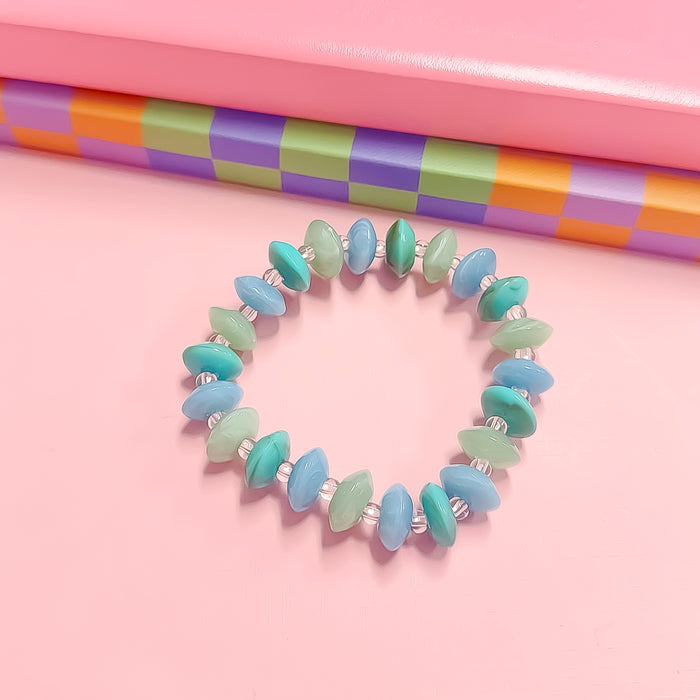 colorful gemstone jewelry, beaded fashion bracelet, gold or silver tone accessory, handcrafted beaded piece, trendy boho chic jewelry, vibrant statement wristwear, artisan handmade design, everyday stackable accessory, fashion jewelry for women, premium jewelry gift idea, boutique style wristwear, elevated modern jewelry