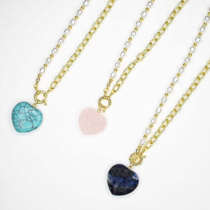 Dainty gold layered necklace with heart stone pendants, wholesale jewelry for women’s boutiques, statement accessory, waterproof necklaces, boutique wholesale jewelry, trendy, hypoallergenic, tarnish free