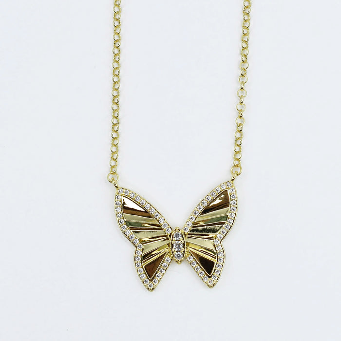 Dainty gold layered necklace with a crystal butterfly pendant, wholesale jewelry for women's boutiques, statement accessory, waterproof necklaces, boutique wholesale jewelry, trendy, hypoallergenic, tarnish free