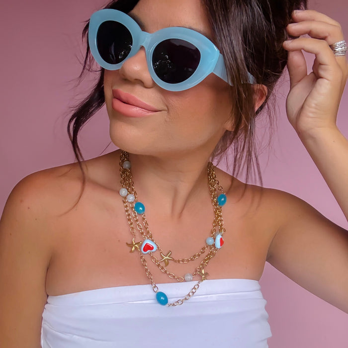 Colorful charms gold necklace featuring gemstone details, layered jewelry design, trendy accessory for women’s jewelry collections, boutique wholesale fashion necklace that is hypoallergenic, tarnish free, and waterproof jewelry with a cute aesthetic statement style