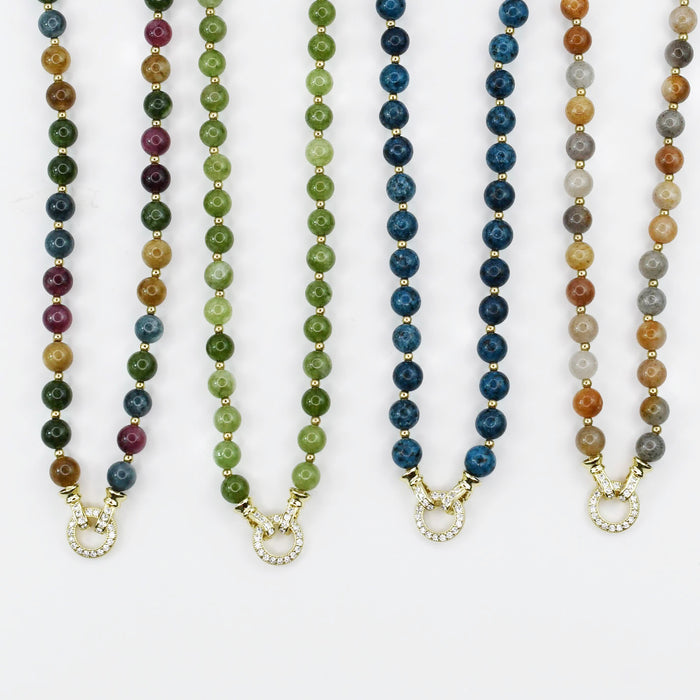 Colorful charms gold necklace featuring gemstone details, layered jewelry design, trendy accessory for women’s jewelry collections, boutique wholesale fashion necklace that is hypoallergenic, tarnish free, and waterproof jewelry with a cute aesthetic statement style
