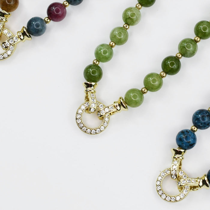 Colorful charms gold necklace featuring gemstone details, layered jewelry design, trendy accessory for women’s jewelry collections, boutique wholesale fashion necklace that is hypoallergenic, tarnish free, and waterproof jewelry with a cute aesthetic statement style